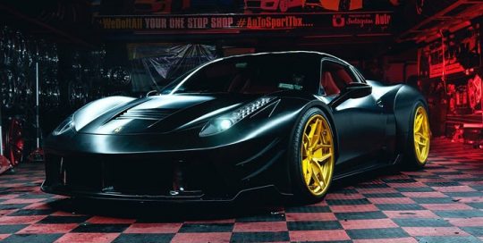 Ferrari wrapped in 3M 1080 Satin Black vinyl