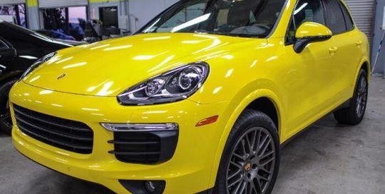 Porsche wrapped in Avery SW Gloss Yellow vinyl
