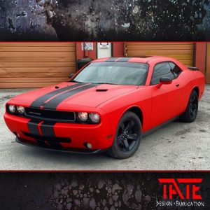 Dodge Challenger wrapped in Matte Red and Brushed Steel vinyls