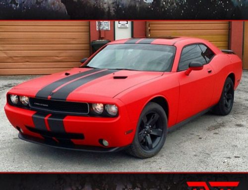 Dodge Challenger wrapped in Matte Red and Brushed Steel vinyls