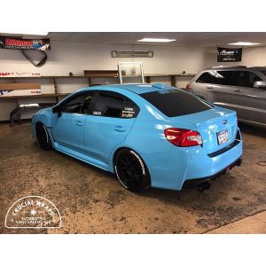Subaru wrapped in 3M 1080 Gloss Sky Blue vinyl