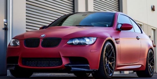 BMW wrapped in 3M 1080 Matte Red Metallic vinyl
