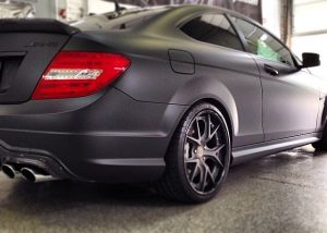 Mercedes Benz wrapped in matte black Avery over gloss black