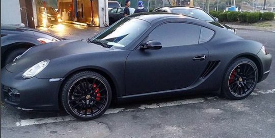 Porsche Cayman wrapped in 1080 Matte Deep Black vinyl
