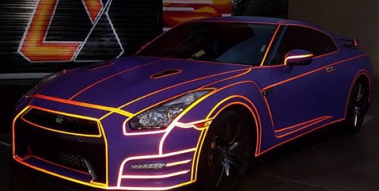 Nissan wrapped in 1080 Matte Royal Purple and 680CR Reflective Orange vinyls