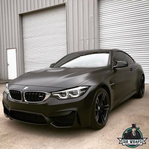 BMW wrapped in Avery SW Satin Black vinyl
