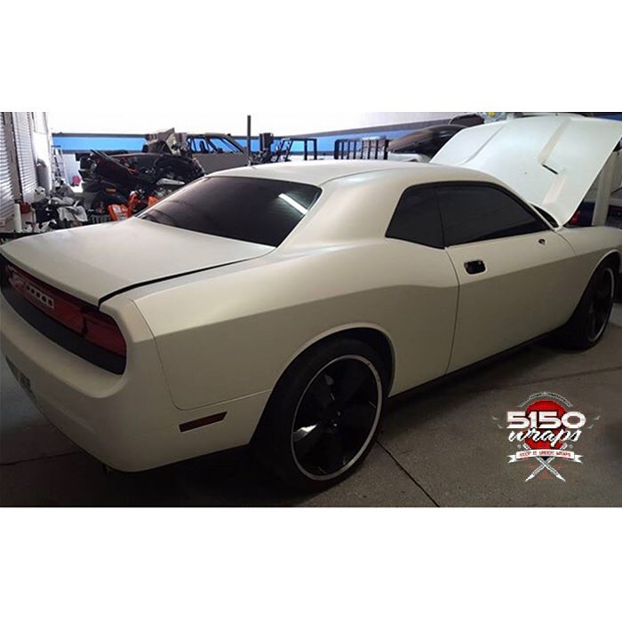 Dodge Challenger wrapped in 3M 1080-SP10 Satin Pearl White