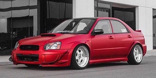 Subaru wrapped in 3M 1080-S363 Satin Smoldering Red