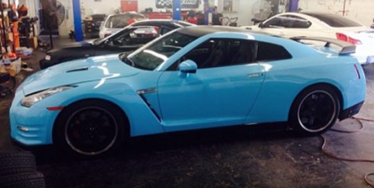 Porsche wrapped in 3M 1080-G77 Gloss Sky Blue
