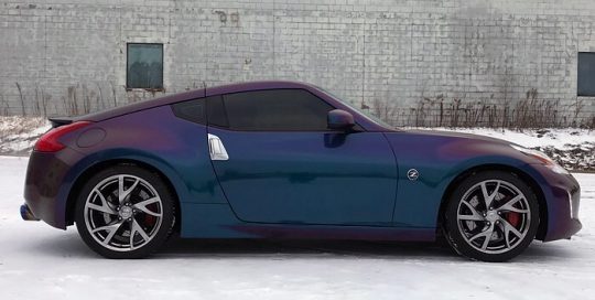 Nissan wrapped in Avery ColorFlow Gloss Rushing Riptide Cyan/Purple shade shifting vinyl
