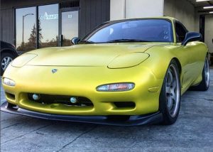 Mazda wrapped in 3M 1080-S335 Satin Bitter Yellow