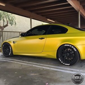 BMW wrapped in 1080 Satin Bitter Yellow vinyl