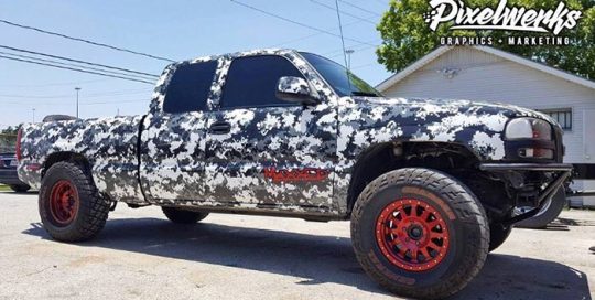 GMC Sierra wrapped in custom printed 3M IJ180Cv3 vinyl