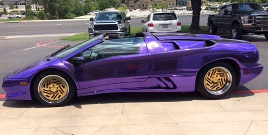 Lamborghini Diablo wrapped in Avery Silver Chrome overlaminated with SF 100 Transparent Purple vinyl