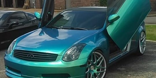 Infiniti G35 wrapped in Orafol Shift Effect Gloss Aquamarine shade shifting vinyl