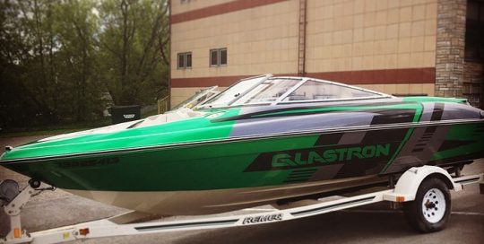 Commercial Boat Wrap wrapped in Gloss Green Envy, Black Metallic and Anthracite vinyls