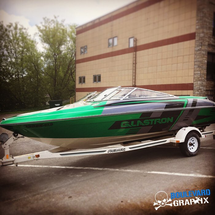 Commercial Boat Wrap wrapped in Gloss Green Envy, Black Metallic and Anthracite vinyls