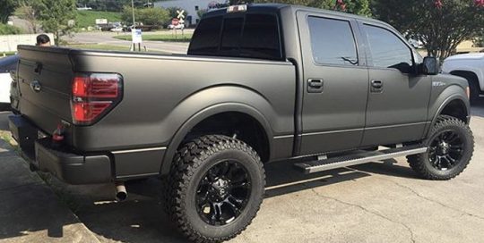 Ford F-150 wrapped in Matte Black vinyl