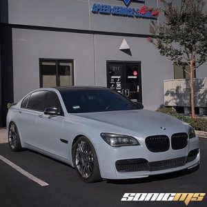 BMW 7 Series wrapped in Satin Battleship Gray vinyl
