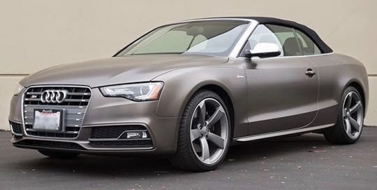 Audi S5 wrapped in Gloss Charcoal Metallic with 8519 Satin overlaminate