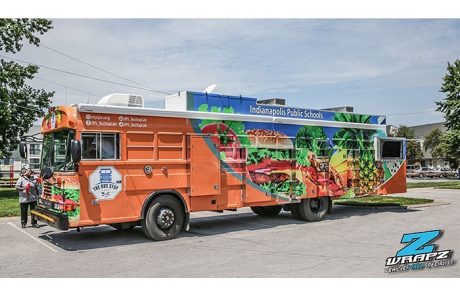 Bus wrapped in custom printed Arlon SLX Flight Technology vinyl and 3270 overlaminate
