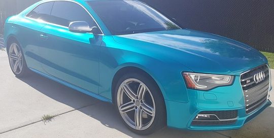 Audi S5 wrapped in Gloss Atomic Teal vinyl