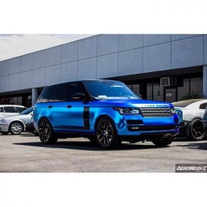 Range Rover wrapped in Avery SW Blue Chrome vinyl overlaminated with 1370Z Luster Clear vinyl