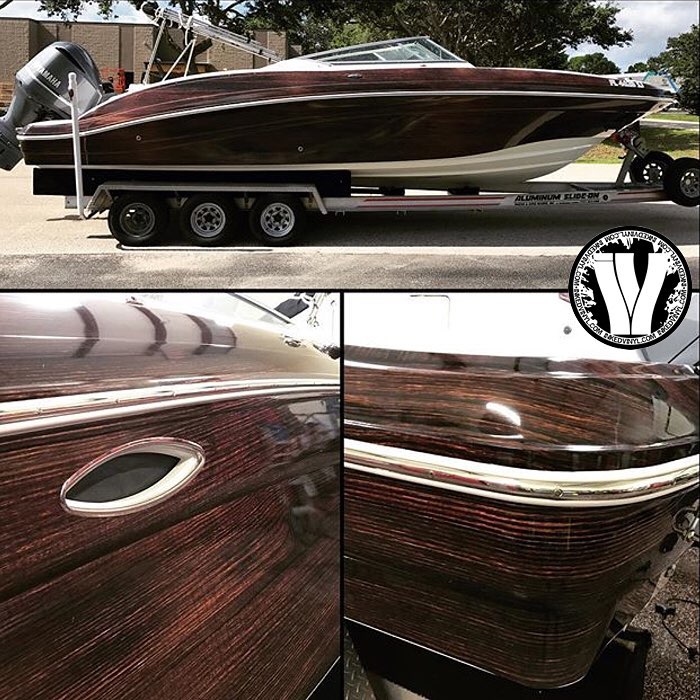 Hurricane Boat wrapped in custom printed wood grain on Avery 1105EZRS vinyl with 1360z Gloss overlaminate