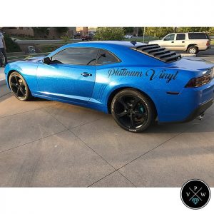 Camaro wrapped in Avery SW Metallic Diamond Blue vinyl