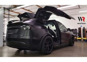 Tesla Model X wrapped in Avery SW Satin Black and 3M 1080 Gloss Black vinyls