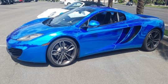 Mclaren wrapped in Avery SW Blue Chrome vinyl