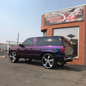 Chevy Tahoe wrapped in ColorFlip Gloss Deep Space Blue/Bronze/Purple shade shifting vinyl