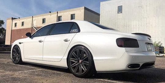 Bentley Flying Spur wrapped in Satin Pearl White vinyl