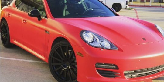 Porsche Panamera wrapped in Avery SW Satin Carmine Red vinyl