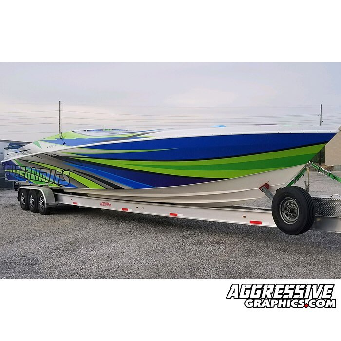 Outer Limits Boat wrapped in custom printed Arlon SLX with 3M 8900 Sunburst Gold Metallic overlaminate