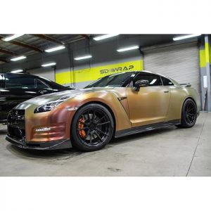 Nissan GTR wrapped in Avery ColorFlow Satin Rising Sun Red/Gold shade shifting vinyl with 3M 8900 Brushed overlaminate