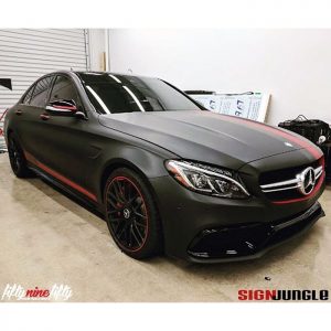 Mercedes C63S wrapped in Matte Deep Black and Avery SW Matte Garnet Metallic vinyls