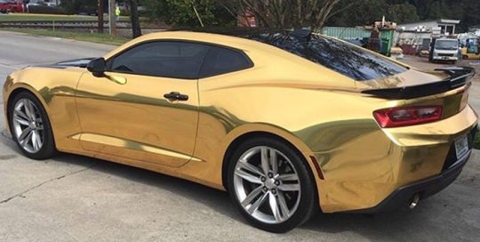 Camaro wrapped in Avery SW Gold Chrome vinyl