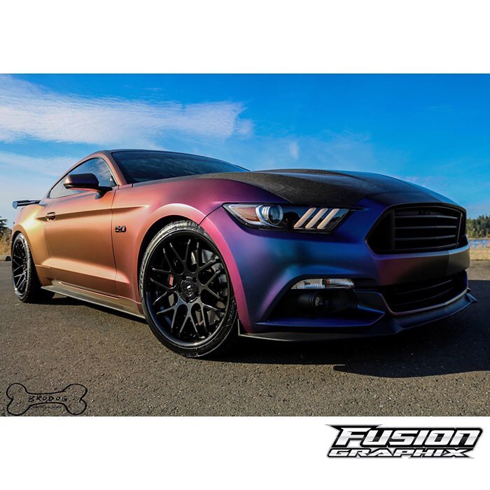 Ford Mustang wrapped in Avery SW ColorFlow Satin Rushing Riptide Cyan/Purple shade shifting vinyl