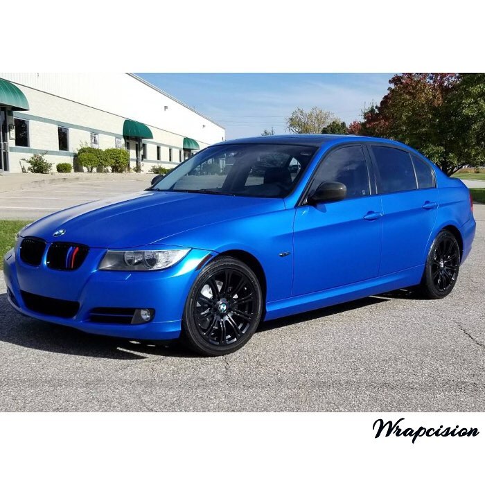 BMW 328i wrapped in Satin Perfect Blue vinyl