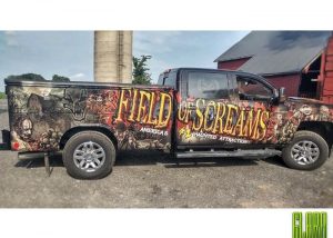 Chevy Silverado wrapped in custom printed Avery 1105 EZRS vinyl with 1360z Gloss overlaminate