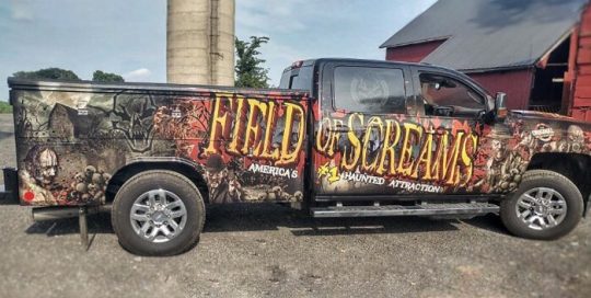Chevy Silverado wrapped in custom printed Avery 1105 EZRS vinyl with 1360z Gloss overlaminate