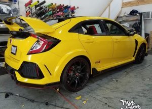 Honda Civic wrapped in Avery SW Gloss Yellow vinyl