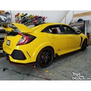 Honda Civic wrapped in Avery SW Gloss Yellow vinyl