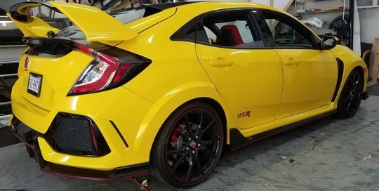 Honda Civic wrapped in Avery SW Gloss Yellow vinyl