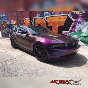 Ford Mustang wrapped in Avery SW Gloss Rushing Riptide Cyan/Purple shade shifting vinyl