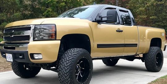 Chevrolet Silverado wrapped in Avery SW Gloss Gold Metallic vinyl