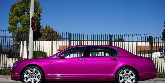 Bentley Flying Spur wrapped in Gloss Fierce Fuchsia vinyl