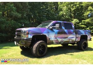 Chevrolet Silverado wrapped in custom printed 3M IJ180mC-120 Metallic Satin White Aluminum vinyl