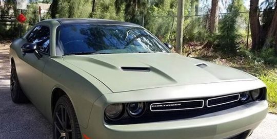 Dodge Challenger wrapped in Matte Military Green vinyl